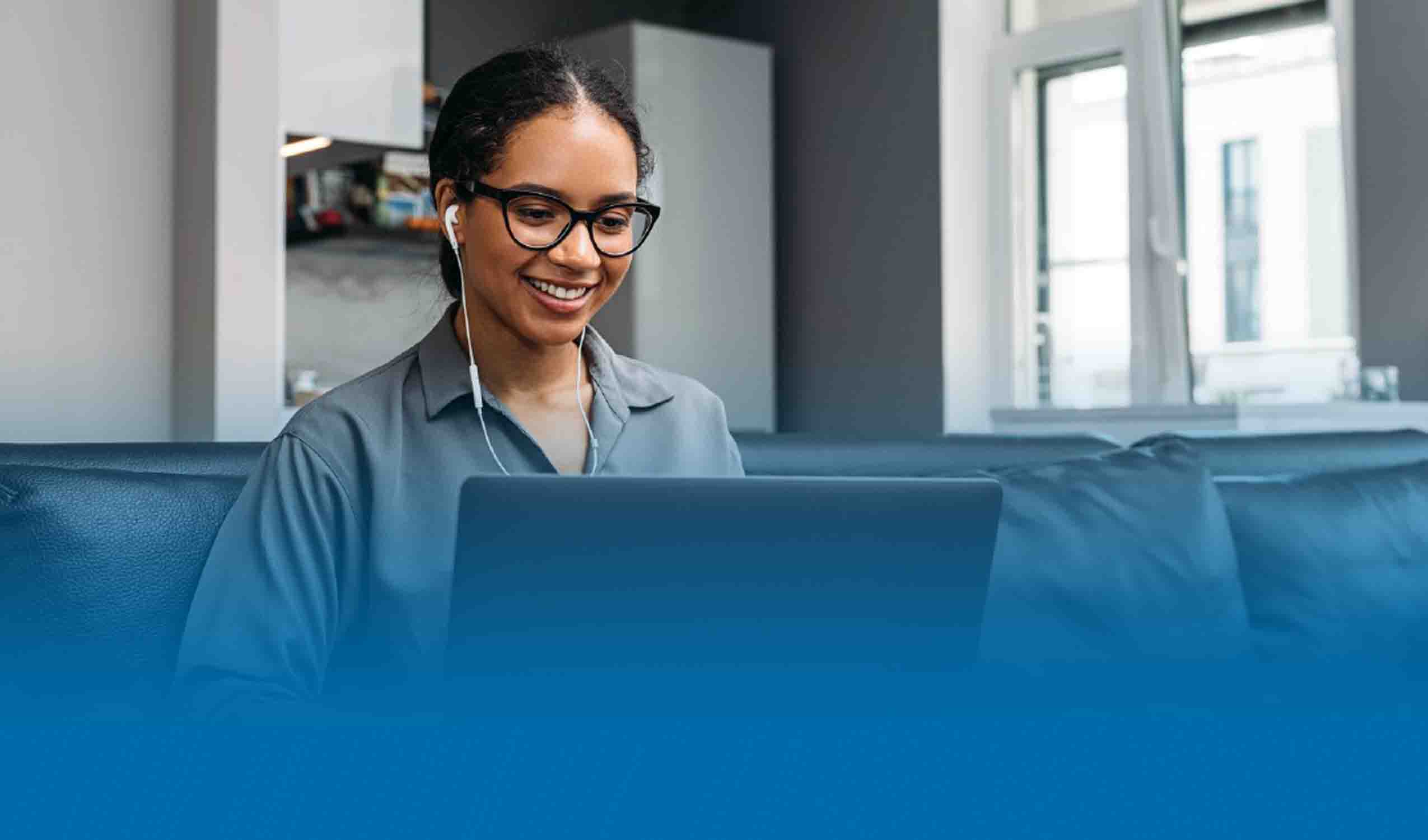 Woman working from home with laptop